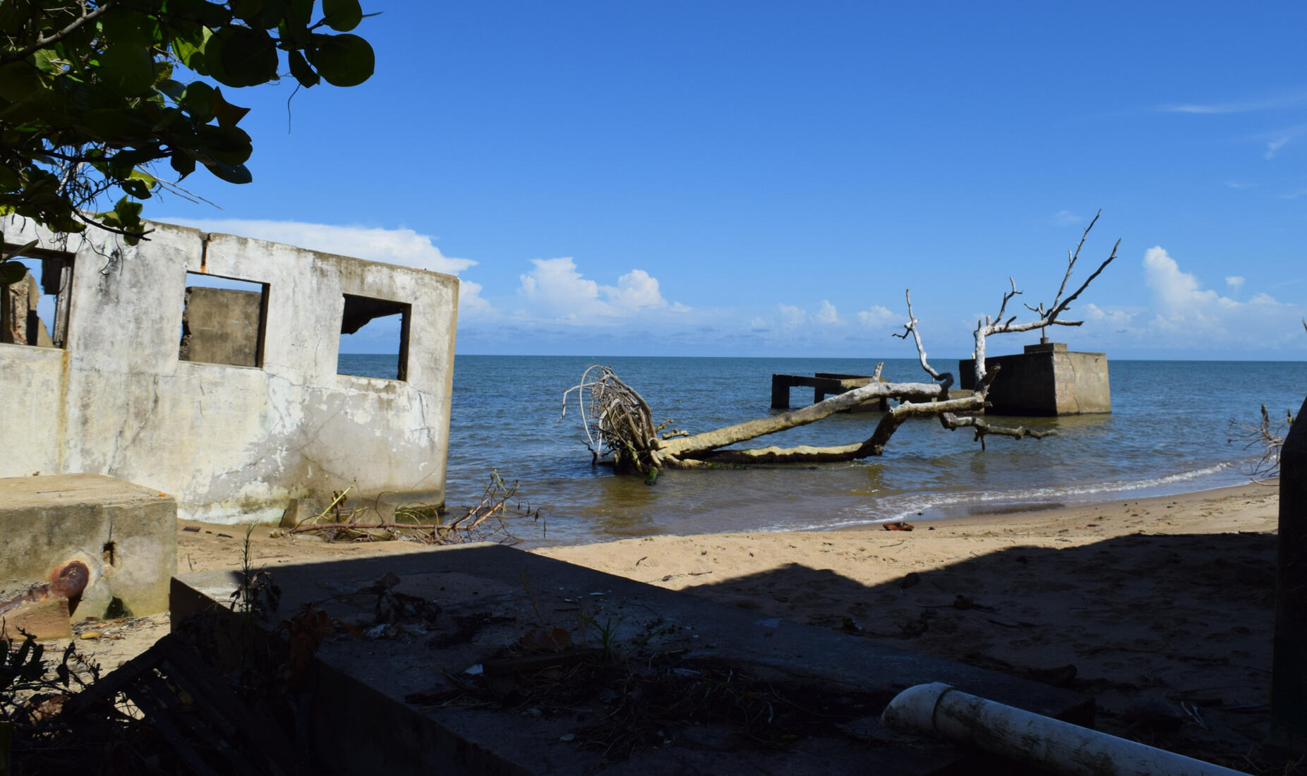 Monkey River Village is a fishing village on the coast of southern Belize. Three streets of the village has fallen into the sea including homes, a soccer field, and half of its cemetery.